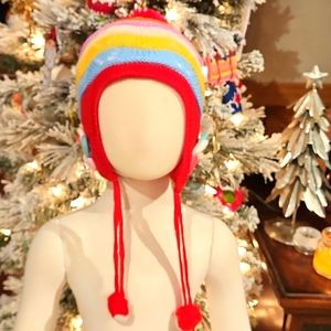 KIDS NEW WINTER HAT SIZE 6-12 MONTH RED WITH MULTICOLOR STRIPES.